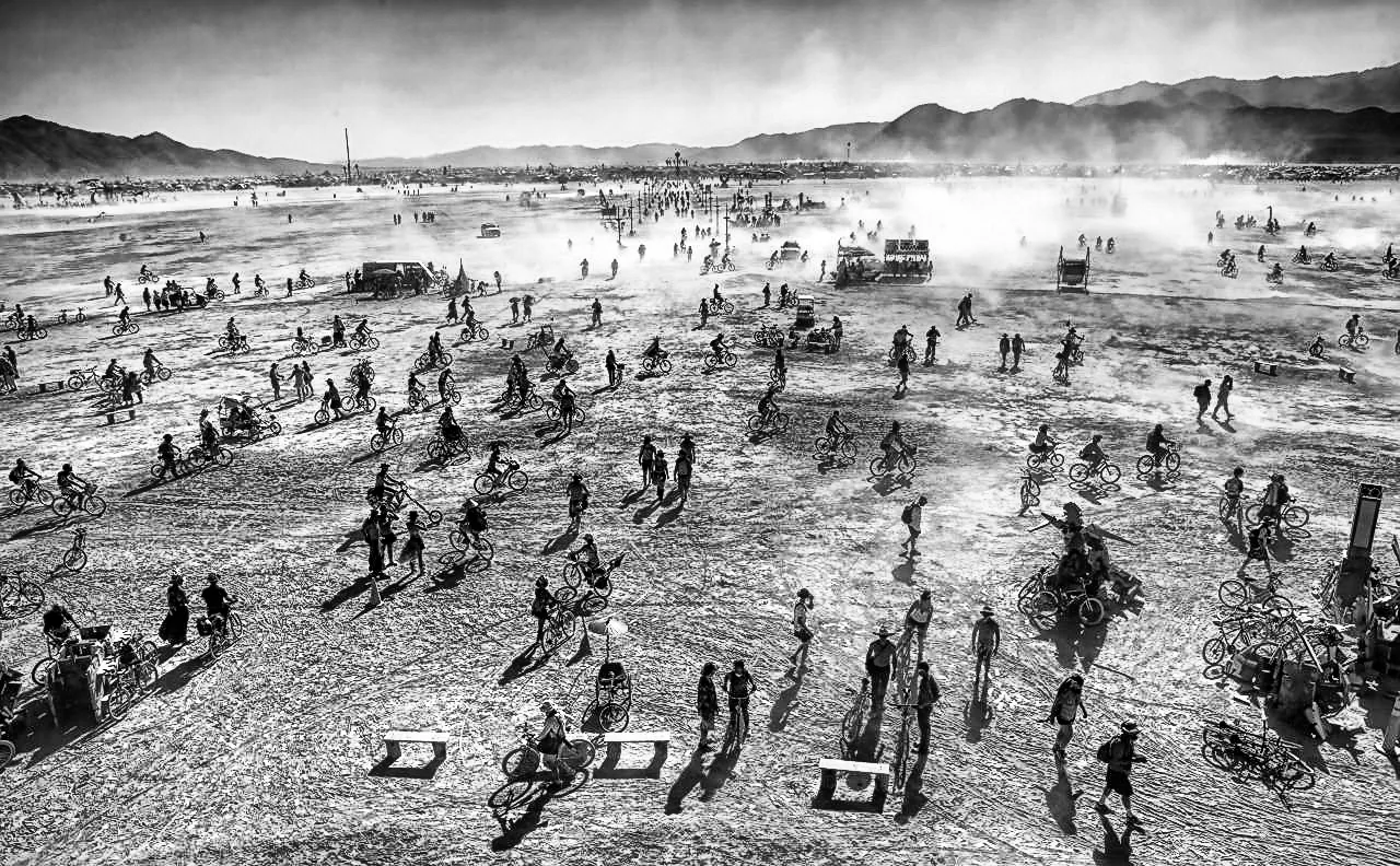 Aerial view of Black Rock City laid out in its semicircular street grid on the playa