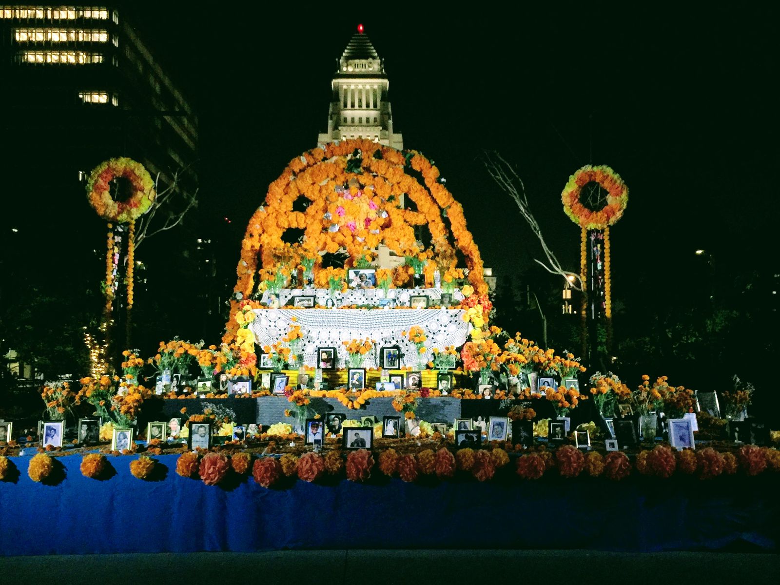 Dia de los Muertos altar at Grand Park, Los Angeles, with City Hall behind (Self Help Graphics & Art)