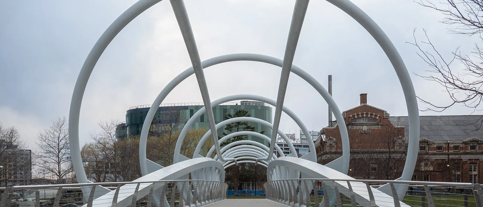 The looping steel arches of the Yards Park bridge at Navy Yard, Washington DC