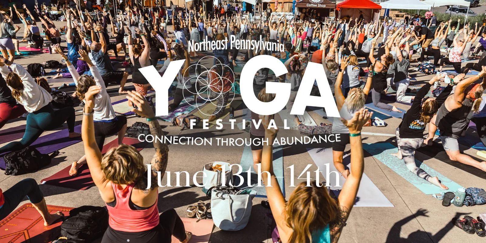 NEPA Yoga Festival crowd flowing through warrior pose at Montage Mountain, with festival wordmark