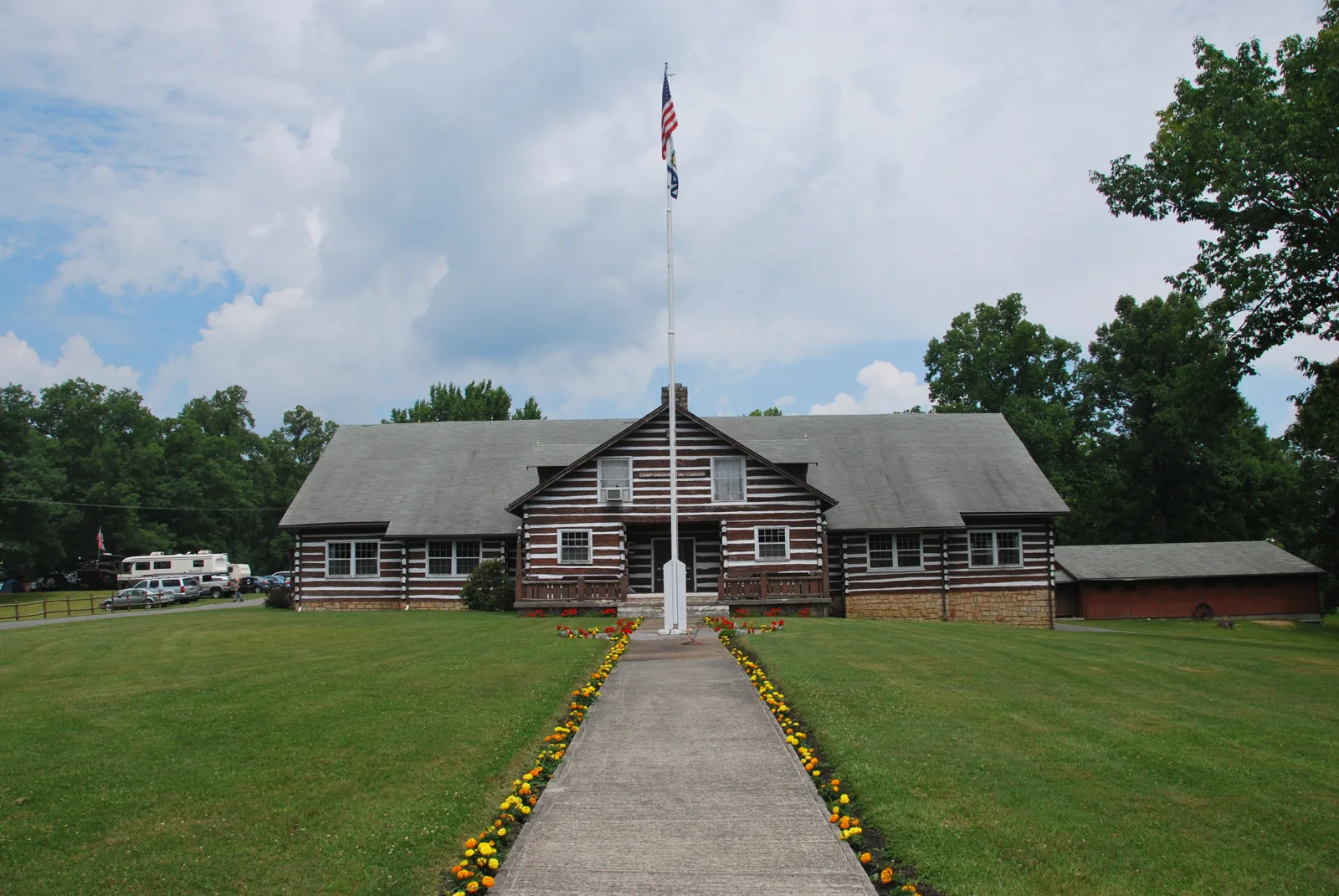 The Great Chestnut Lodge at Camp Washington-Carver, with its lawn and flagpole
