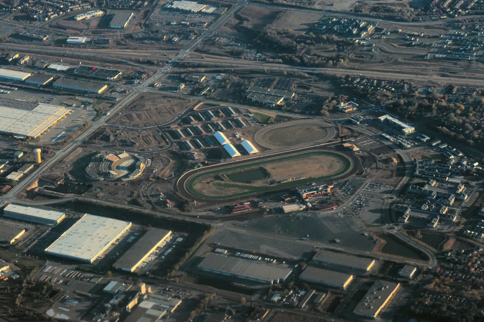 Aerial view of the Canterbury Park racetrack and grandstand in Shakopee