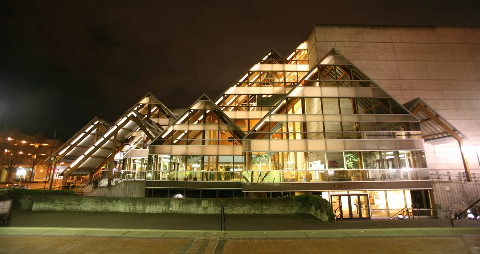 The glass front of the Hult Center for the Performing Arts in Eugene at night